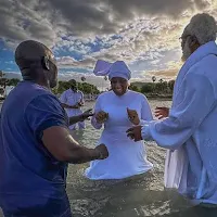 ‘Time to start anew.’ Miami church leads Easter baptism on Virginia Key beach