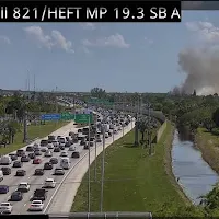 Firefighters battle fire near Miami Executive Airport. Officials warn of smoke